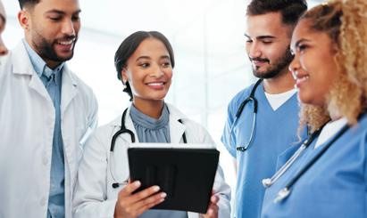 Doctor, teamwork and group planning on tablet for healthcare research, workflow and collaboration in residency. Nurse and people with new digital technology or solution for diversity in medical trial