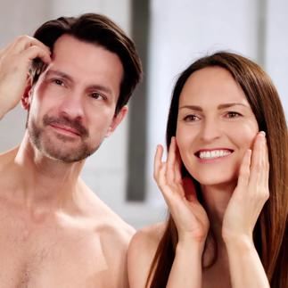 Young couple practicing daily skin care routine together