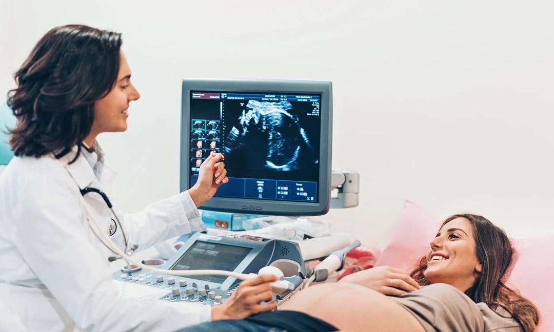 Pregnant woman having an ultrasound