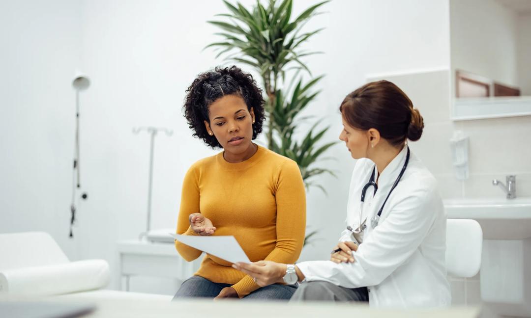 Patient and doctor discussing test results.