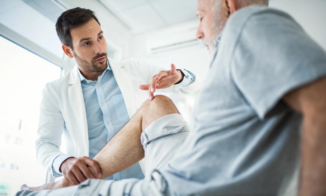 Senior man having medical exam.
