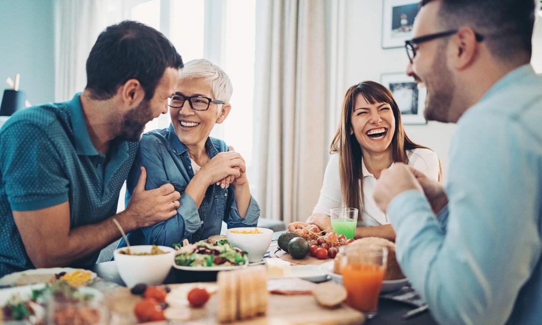 Mother celebrating with her adult children