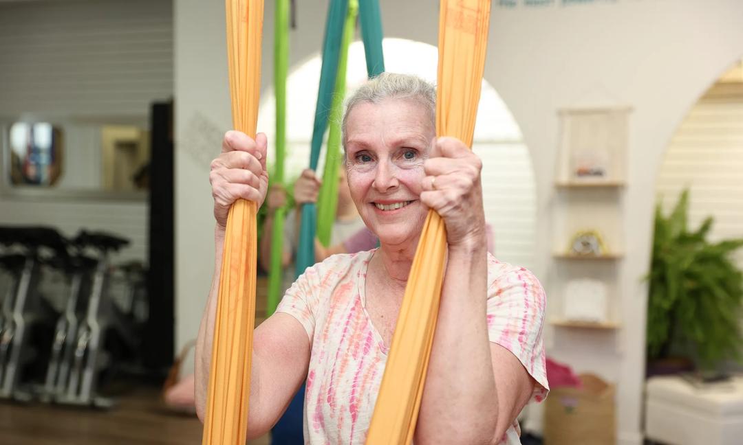 woman in yoga swing