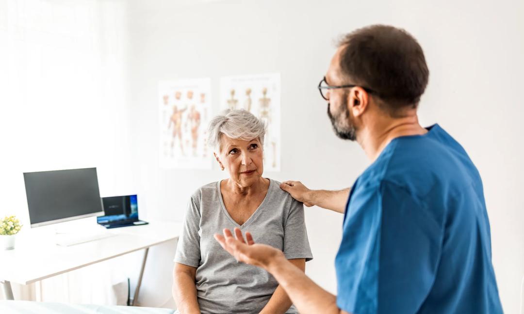 Giving careful instructions to his patient