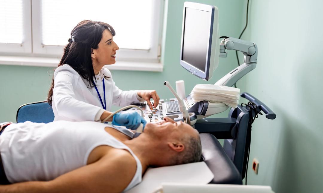 Male patient having ultrasound examination in medical clinic