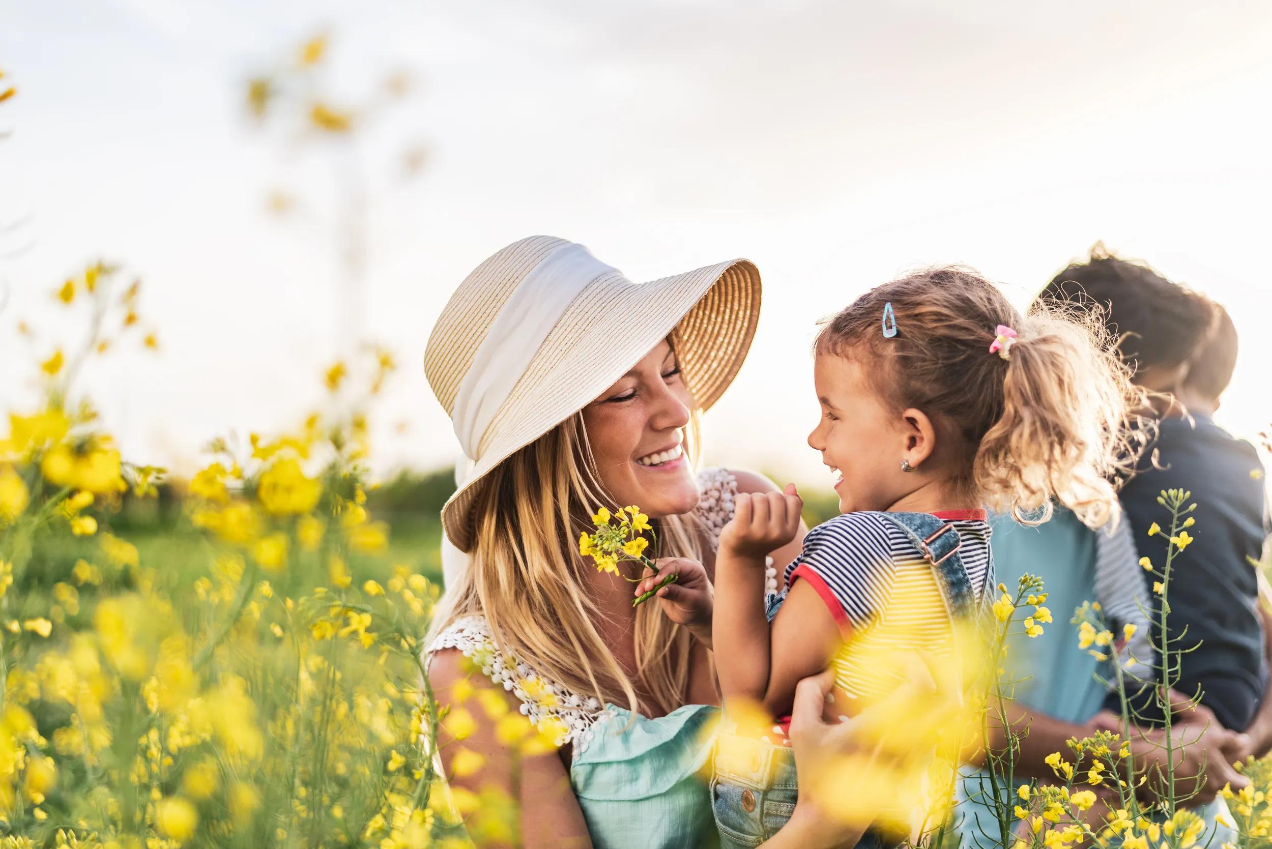 Young happy family enjoying nature
